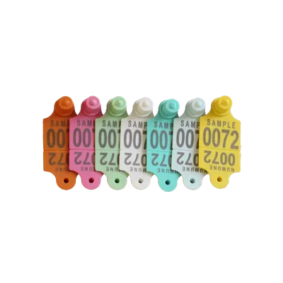 Small livestock ear tag with metal tip tracking system to prevent loss.