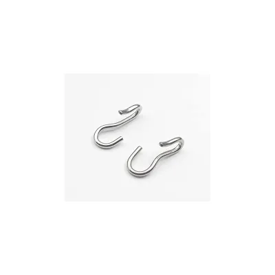 Durable stainless steel S hooks used in farm equipment connections.